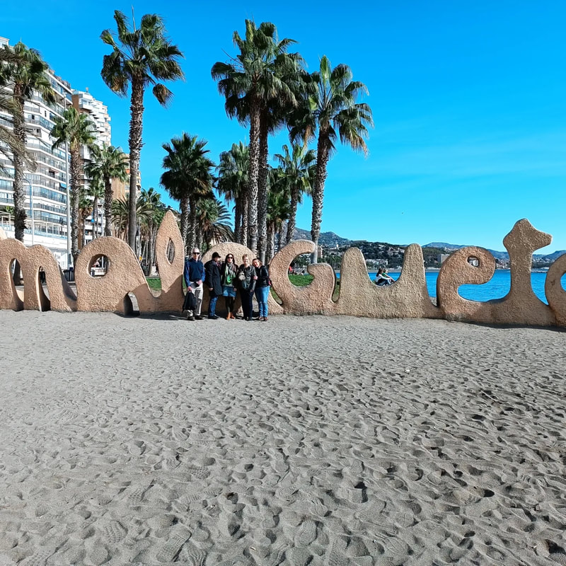 Seniors Spanish abroad group visiting Malagueta beach