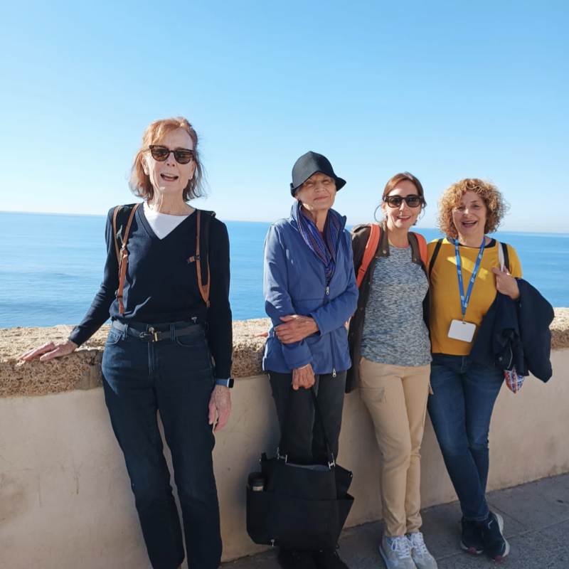 Four senior students by the waterfront in Cadiz