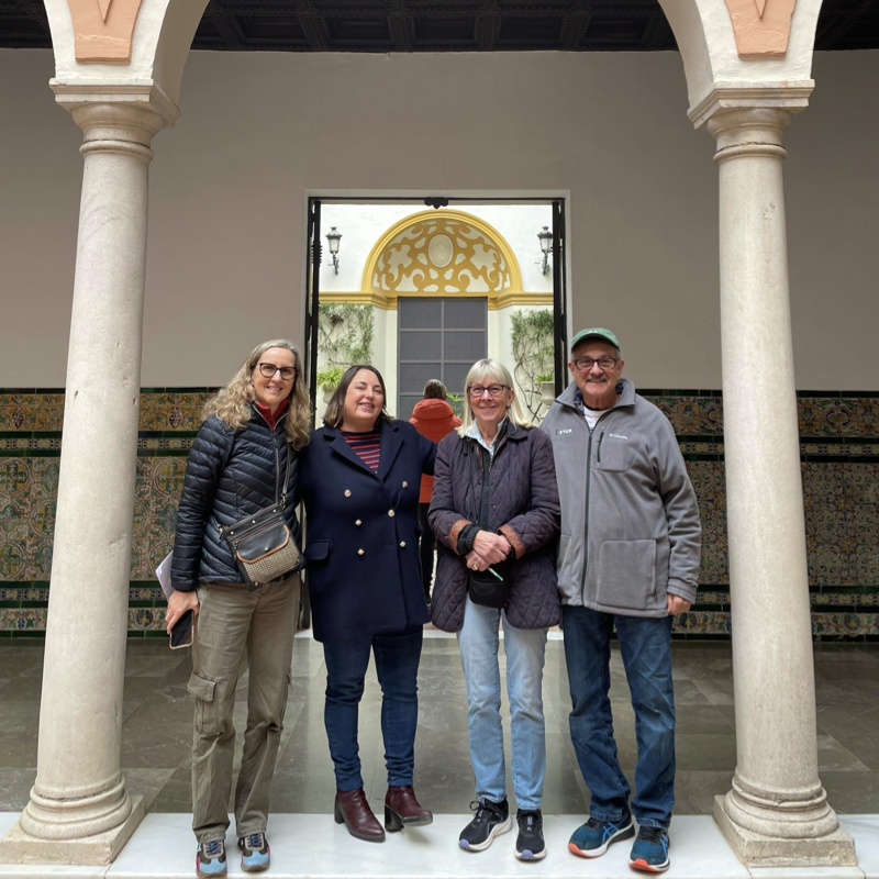 A professor and three senior students in Seville's Museum of Fine Arts